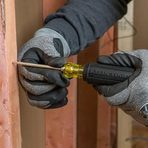 Worker using 650 Scratch Awl With A 3 And A Half Inch Shank And Cushion Grip For Precise Scribing, Hole Starting, Punching And Metalwork.