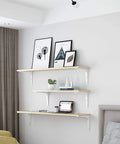 Built Like A Tank Heavy Duty Steel Shelf Brackets With Rock Solid Holding Power For Your Floating Shelves And Wall Corner Displays, No Sweat Setup, Dope White Finish, 75Mm Size, 2 Pack Kit in a home setting.