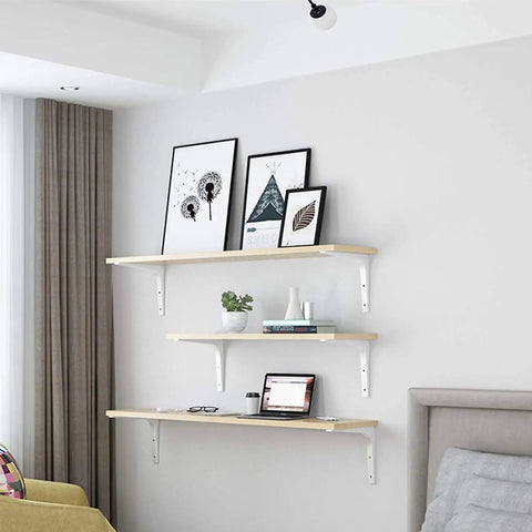 Built Like A Tank Heavy Duty Steel Shelf Brackets With Rock Solid Holding Power For Your Floating Shelves And Wall Corner Displays, No Sweat Setup, Dope White Finish, 75Mm Size, 2 Pack Kit in a home setting.