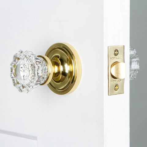 Old School Charm Classic Rosette With Egg And Dart Round Door Knob For Vintage Style Doors visible on a white door.