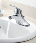 Bathroom with Low Arc One Handle Chrome Bathroom Faucet with aerated flow over white sink