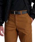 Leather Double Prong Belt For Men In Black Built Tough With Roller Buckle Fully Adjustable Strap For All Day Comfort Durable Everyday Belt For Jeans Workwear And Casual Looks shown with brown pants