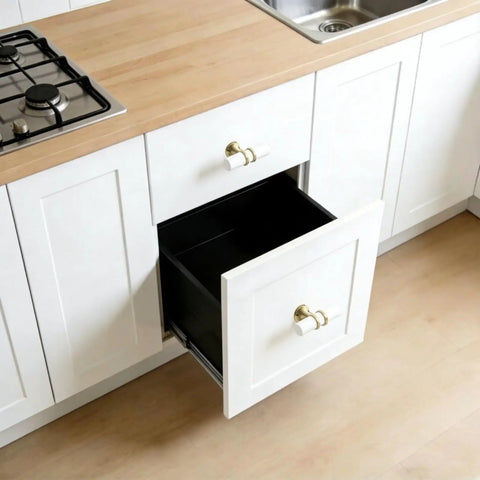 Two Tone White Matte Cabinet Pulls With Gold Mounting Brackets Stainless Steel Hardware For Modern Kitchen Cabinets And Dressers 50mm Size 8 Pack installed on a kitchen drawer