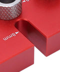 Close-up of the Top Shelf Wood Doweling Jig Drill Kit with red aluminum base and adjustable 8mm bushing for precise joinery.