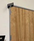 Heavy Duty Horizontal Warehouse Aisle Signs Custom Engraved L Shaped Rack Markers With Kickass Durable ABS Plastic Build Pre Drilled Mounting Holes Ready To Hang Made In Usa on wooden door.