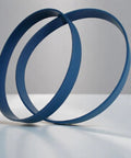 Blue Ultra Duty Band Saw Tires for 33 WM14 band saw urethane replacement part shown on a gray surface.