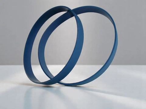Blue Ultra Duty Band Saw Tires for 33 WM14 band saw urethane replacement part shown on a gray surface.
