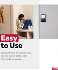 Wall Mounted Garage Door Opener With Lighting Control Wired Power Only No WiFi Needed Designed For Security Plus 2 Point 0 Openers Black Finish Easy Setup No Hassle Installation For Everyday Convenient Use, mounted on wall next to person sitting.