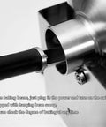 Next Level Stainless Steel Household Coffee Roaster Setup With Flexible Thermometer Probe, close-up of hanging bean scoop.