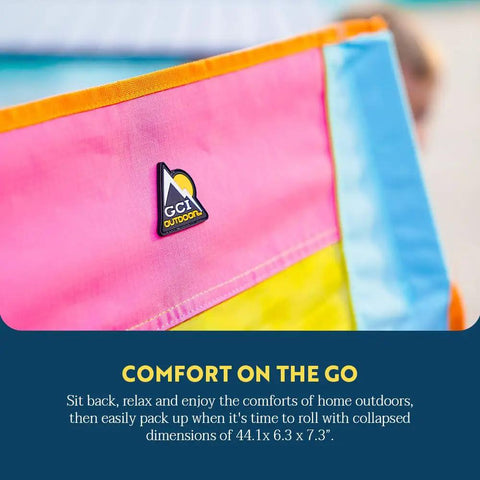 Colorful fabric of Sweet Tea Comfort Pro Rocker Outdoor Rocking Chair with GCI outdoor logo visible.