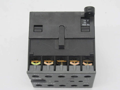 Front view of Miniature 3-pole contactor B7-30-10-01 with 24V coil, showing terminals, compact industrial relay for three-phase switching.