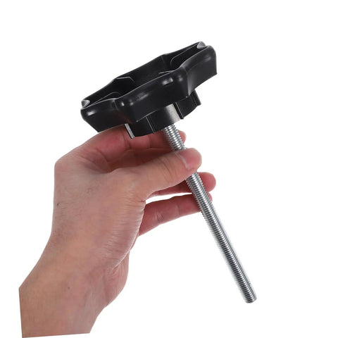 Hand holding Spare Tire Hold Down Bolt For Car Spare Wheel Mounting Universal Fitment Tire Fastener Clamp