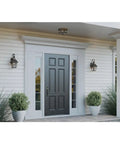 Image of a porch with two One Light Clear Beveled Glass Farmhouse Outdoor Wall Lanterns in Antique Bronze beside the door.