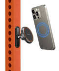 Gym Ready Magnetic Phone Holder With Alloy Base And Ball Joint Attaches To Metal Surfaces Dual Magnetic Mount For MagSafe iPhone 12 13 14 15 16 17 And Android With Metal Ring Secure Grip shown attached to gym equipment