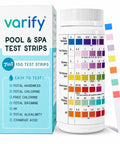 Top Shelf 7 In 1 Pool Spa And Hot Tub Test Strips 150 Count Water Chemistry Kit next to test strip chart and packaging.