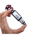 Hand holding 12V DC Linear Actuator With 10/15/20/25mm Stroke, Mini Electric Push Rod For Smart Home Automation And Controls.