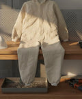 Canvas Sandblasting Suit With Hood Full Body Dustproof Workwear For Grinding And Sanding In Factory Workshops Hardcore Protection And Comfortable Fit Durable Grit Proof Coverall For Maintenance Jobs, beige hooded coverall on workbench