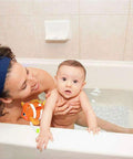 Top Rated Premium Heavy Duty Non Slip Shower Mat For Bathtub With Clear Textured Surface And Rock Solid Suction Cups in use with baby.