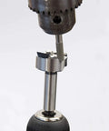 Pro Grade Forstner And Hinge Boring Bit Sharpener showcasing sharpener attachment to a drill bit, designed for wood drilling precision.