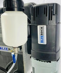 Close-up of the Knockout Performance Heavy Duty Magnetic Drill Press showing motor and fluid container, designed for metal projects.