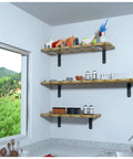 Top Tier Heavy Duty L Shaped Corner Brackets For Shelving Set Of 2 Black Metal Wall Mounts support rustic wooden shelves in a kitchen.