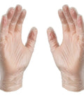 Two hands wearing Heavy Duty Clear Vinyl Work Gloves Three Mil Thick Box Of One Hundred Xlarge Latex Free And Powder Free.