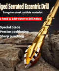 Golden tungsten-carbide drill bit with four-flute core design, close-up side view on rocky surface