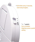 Close-up of Ultra Thin Window Alarm Pack Of 4 With 120dB Siren and Vibration Sensor showing LED and switch details.
