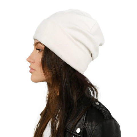 Side view of woman wearing Cozy Satin Lined Slouchy Beanie For Women Sleep Cap Night Hair Care Hat Rib Knit Winter Warmth Milky White