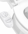 Close-up of dual nozzle bidet attachment control panel on toilet seat, part of Dual Nozzle Bidet Attachment For Toilet Seat No-Fuss Non-Electric.