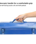 Hand holding the Badass Heavy Duty Iron Toolbox With Secure Lock And Reinforced Cross Punched Base 24 Inch, showcasing its telescopic handle.