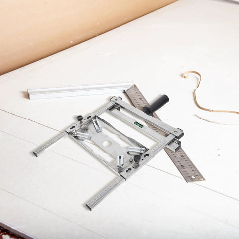 Adjustable Stainless Steel Edge Guide Positioner For Cutters And Grinders Heckin Solid Heavy Duty Metal Workshop Fence on a table.