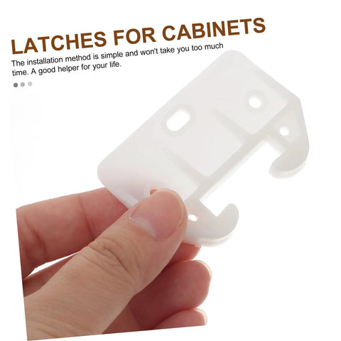 Hand holding a piece from the 12 Piece Plastic Drawer Latch Kit Sliding Rails For Kitchen Cabinets And Dressers.