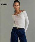 Fresh 4 Pack Skinny Belts For Women Soft Pu Leather Thin Waist Belt With Shiny Gold Buckle Perfect For Jeans And Dresses To Nail Your Daily Fit And Serve Fresh Looks worn with a casual white top and blue jeans.