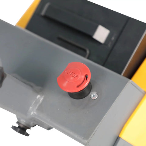 Close-up of the red stop button on the Apollo Full Electric Tugger Walkie Tractor with safety features.