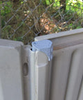 Hella Tough Steel Core Left Replacement Hinge For 6X5 Resin Shed Door Slide Lid mounted on resin lid showing metal reinforcement.