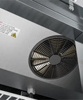 Interior view of Straight Up Heavy Duty Commercial Two Door Refrigerator 35 Cubic Feet Stainless Steel showing fan and warning label.