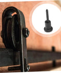 Sliding Barn Door Track Spacers Kit With Breezy Install Aesthetic Wall Mount Hardware visible with pipe clamps and screws