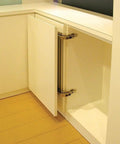 Concealed Lateral Swing Door Hinge Set For Tight Spaces Built Tough Durable Quiet Soft Close Cabinet Hinges Easy To Install Space Saving Sliding Door Hardware For Corner Cabinets, showing installed hinge on corner cabinet.