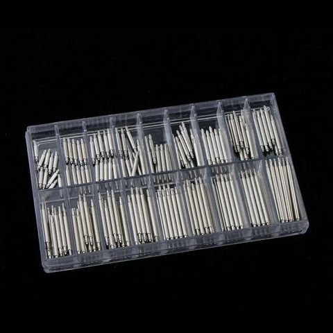 Stainless Steel Watch Link Pins Kit With Storage Box, 180 Pieces, 18 Sizes, 1.8mm And 0.9mm Spring Pins For Metal Links, Replacement Tool Set For Watchmakers And DIY Repair Pros. Clear box with assorted stainless steel watch link pins.