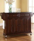 Slick Granite Top Rolling Kitchen Island Cart With Solid Mahogany Frame And Vintage Brass Pulls, spacious storage, black top, rolling design.