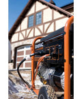 Electric-Start 17500-Watt Gas Portable Generator with Durable Steel Frame OHVI Engine in use outside a house