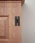 Heavy Duty Pack Of 2 Black Wrought Iron H Door Hinges 3 Inch Flush Mount Cabinet Hardware displayed on a wooden cupboard.