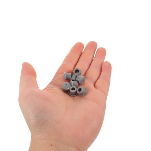 Hand holding 30 Pack Sewing Machine Rubber Needle Rod Covers With Silicone Grommet Plugs For Surface Protection And Precise Fit Pro Grade Replacement Parts For Professional Equipment Maintenance