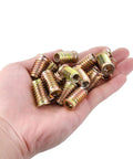 50 Pieces 5/16-18 Threaded Wood Inserts Set For Furniture Making And DIY Projects Flush Nut Inserts held in a hand