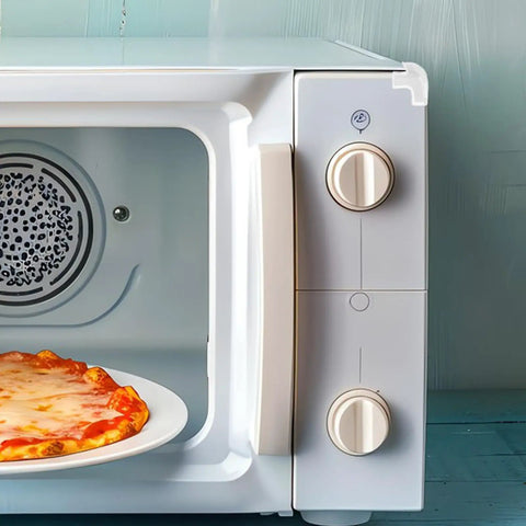 Microwave with pizza inside and corner fitted with 20 Pcs PVC Corner Protectors For Furniture Edge Safety Guards For Tables And Chairs