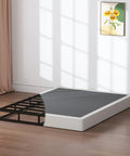 Heavy Duty Queen Box Spring 7 Inch Metal Frame Mattress Foundation Bed Base Built Tough For Rock Solid Support And Zero Flex Design 3000 Pound Weight Limit in cozy bedroom setting.