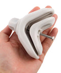 Hand holding a 2 Pack Kids Crib Rail Connector Clips For Playpens, Safe Locking Bed Rail Clamps, Grey, showing the side view.