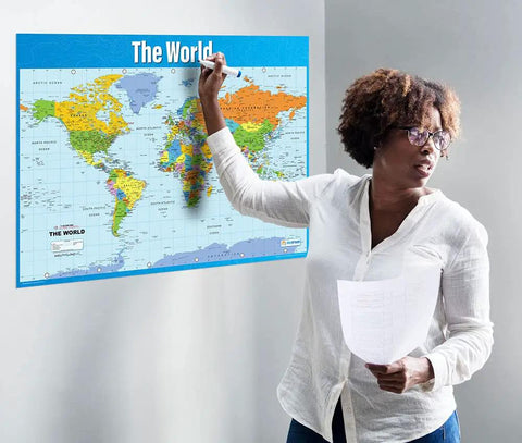 Teacher presenting World Map Classroom Poster Extra Large 33 By 23 Point 5 Inches Laminated Geography Wall Chart for Classrooms.