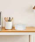 Slick Heavy Duty Double Sided Tape For Quick Fixes And Secure Mounting Reusable Transparent Adhesive Roll on wooden desk.